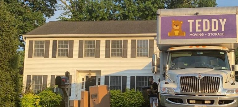 moving truck in front of a house