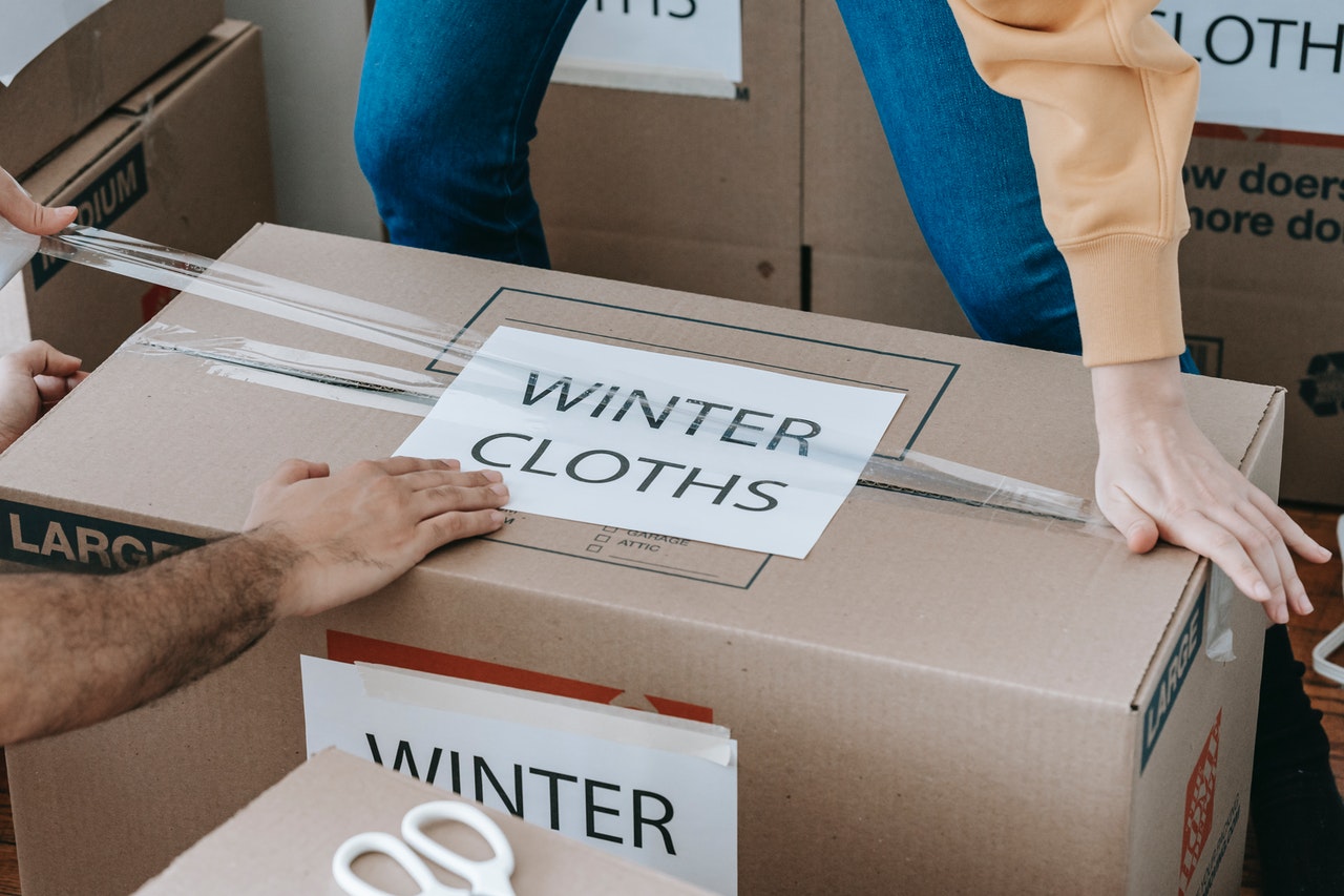 people about to learn how to label moving boxes.