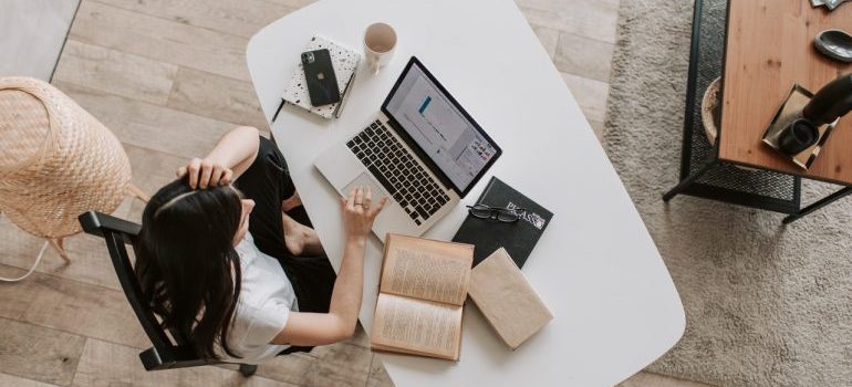 A young woman working from home.