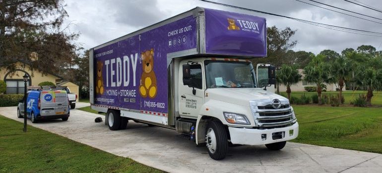 teddy moving truck in the driveway