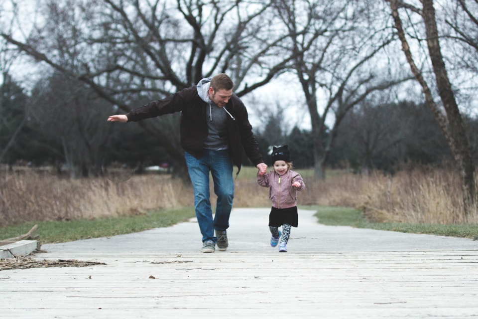 father and a kid running