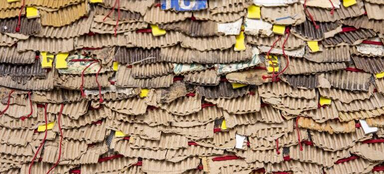 Corrugated paper with red string